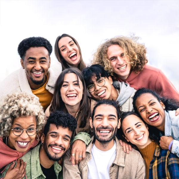 a diverse group of young people smiling